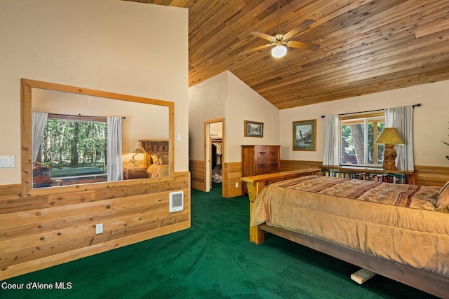 bedroom featuring wooden ceiling, carpet, wood walls, a wainscoted wall, and high vaulted ceiling