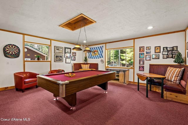 game room with a textured ceiling, baseboards, pool table, and carpet