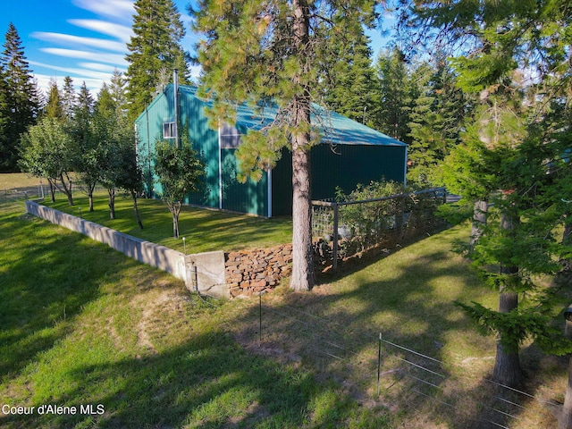 5758 E Burma Rd, Harrison, ID 83833 - view of yard with an outdoor structure, fence, and a pole building