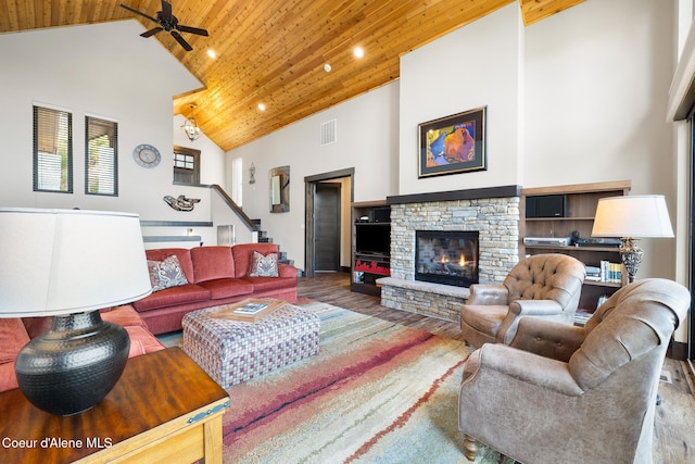 7431 E Cumberland Ct, Hayden, ID 83835 - living area featuring ceiling fan, high vaulted ceiling, wood finished floors, and wood ceiling