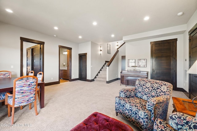 7431 E Cumberland Ct, Hayden, ID 83835 - living area featuring baseboards, recessed lighting, light colored carpet, and stairway