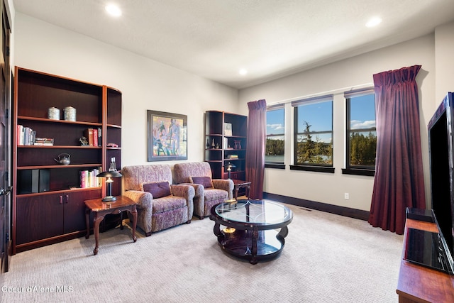 7431 E Cumberland Ct, Hayden, ID 83835 - carpeted living room featuring baseboards and recessed lighting