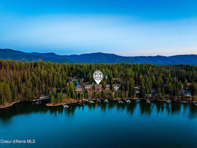 7431 E Cumberland Ct, Hayden, ID 83835 - aerial view with a view of trees and a water and mountain view