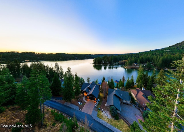 7431 E Cumberland Ct, Hayden, ID 83835 - aerial view featuring a view of trees and a water view