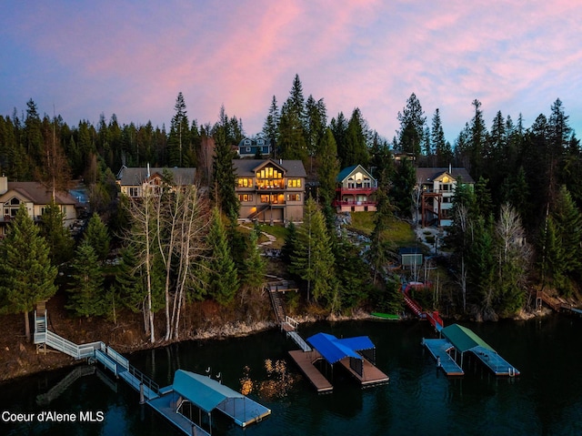 7431 E Cumberland Ct, Hayden, ID 83835 - aerial view at dusk with a water view