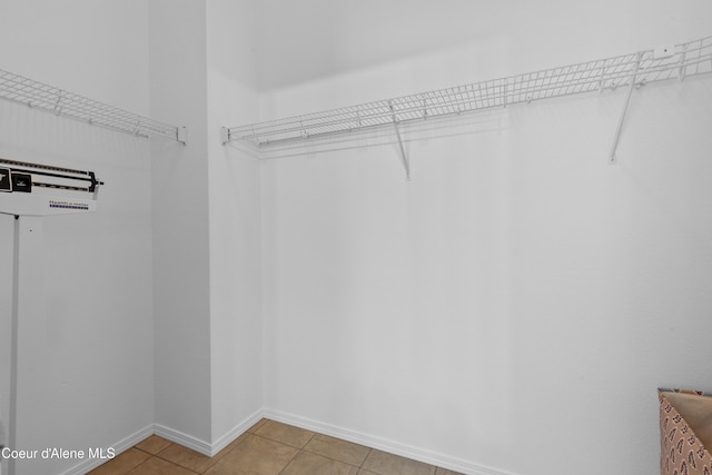 5660 N Loraine St, Coeur Dalene, ID 83815 - walk in closet with light tile patterned floors