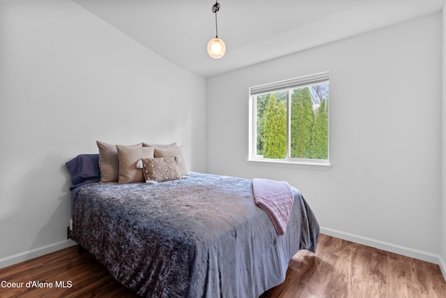 5660 N Loraine St, Coeur Dalene, ID 83815 - bedroom with baseboards and wood finished floors