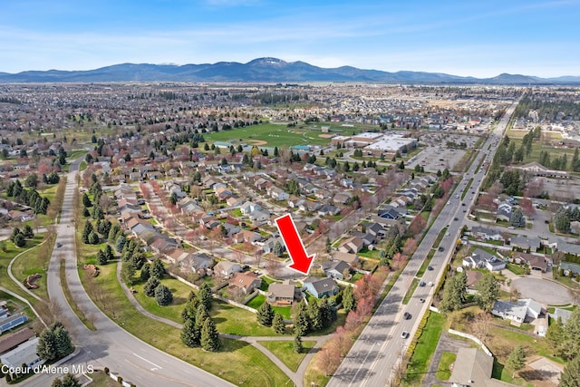 5660 N Loraine St, Coeur Dalene, ID 83815 - drone / aerial view featuring a residential view and a mountain view