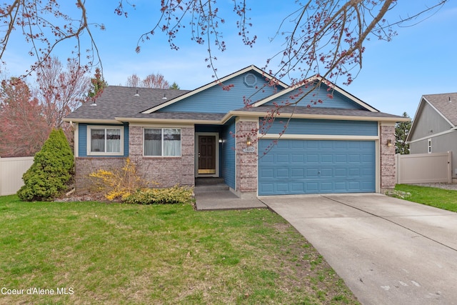5660 N Loraine St, Coeur Dalene, ID 83815 - single story home featuring a front lawn, fence, a garage, and concrete driveway