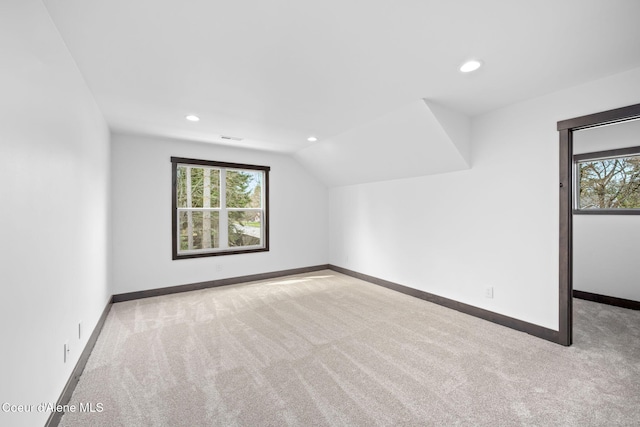 bonus room featuring recessed lighting, baseboards, and carpet floors
