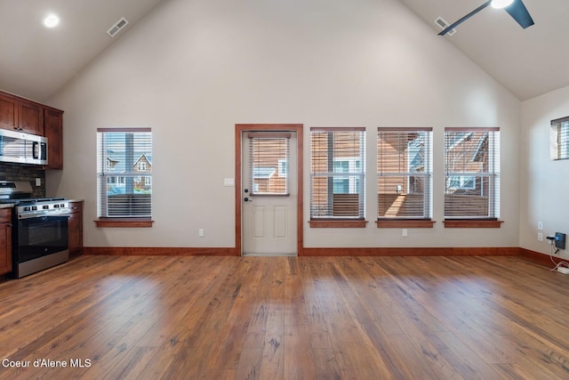45 Welty Dr, Dover, ID 83825 - kitchen featuring visible vents, high vaulted ceiling, appliances with stainless steel finishes, and light wood finished floors