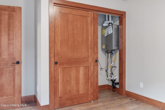 45 Welty Dr, Dover, ID 83825 - interior space with water heater, baseboards, and wood finished floors