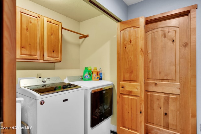181 E Deer Meadow Ln, Blanchard, ID 83804 - laundry area with cabinet space and washer and clothes dryer