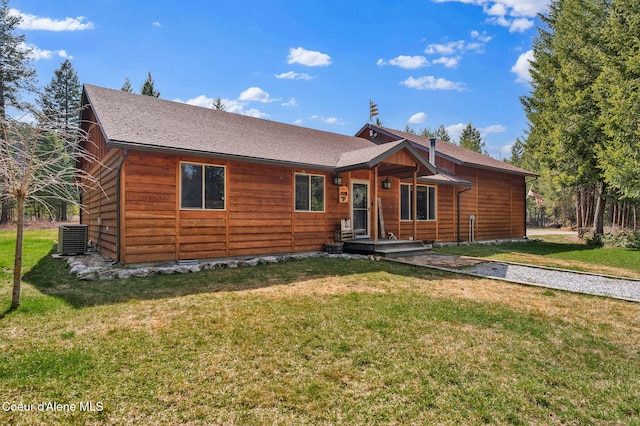 181 E Deer Meadow Ln, Blanchard, ID 83804 - rustic home with a front yard and central AC unit