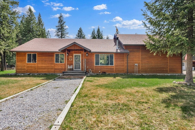 181 E Deer Meadow Ln, Blanchard, ID 83804 - chalet / cabin featuring a front lawn and a shingled roof