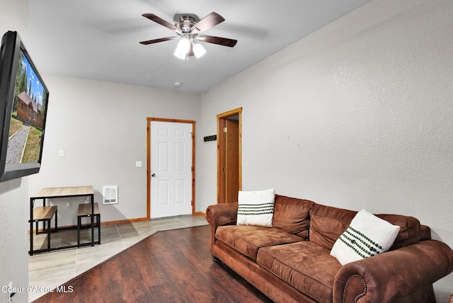 181 E Deer Meadow Ln, Blanchard, ID 83804 - living room featuring visible vents, baseboards, wood finished floors, and ceiling fan