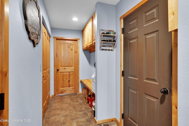 181 E Deer Meadow Ln, Blanchard, ID 83804 - mudroom with baseboards and recessed lighting