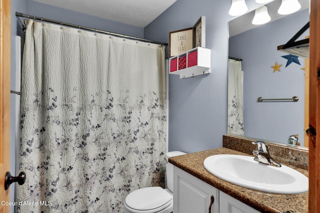 181 E Deer Meadow Ln, Blanchard, ID 83804 - full bath featuring curtained shower, vanity, and toilet