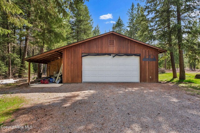 181 E Deer Meadow Ln, Blanchard, ID 83804 - garage with a garage and gravel driveway