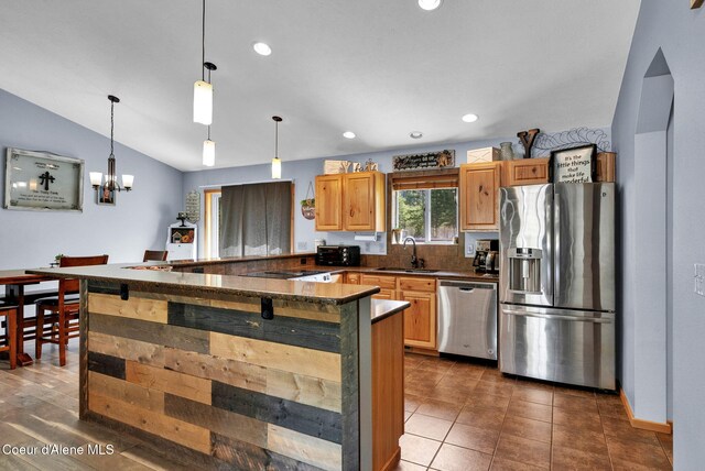 181 E Deer Meadow Ln, Blanchard, ID 83804 - kitchen with an inviting chandelier, a sink, dark countertops, appliances with stainless steel finishes, and recessed lighting