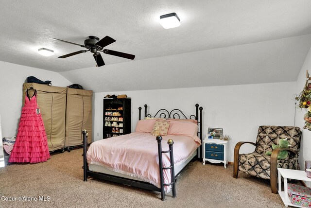 181 E Deer Meadow Ln, Blanchard, ID 83804 - carpeted bedroom featuring a textured ceiling, a ceiling fan, and lofted ceiling