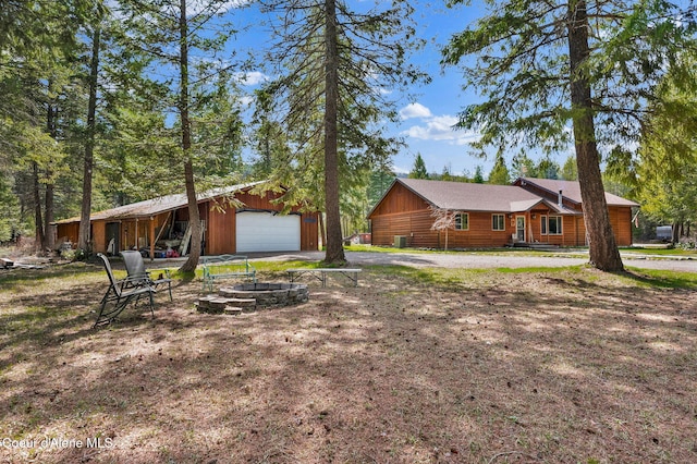 181 E Deer Meadow Ln, Blanchard, ID 83804 - rustic home featuring an outbuilding and a garage