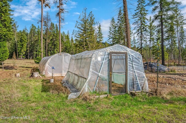 164 Generations Dr, Athol, ID 83801 - view of greenhouse with a view of trees