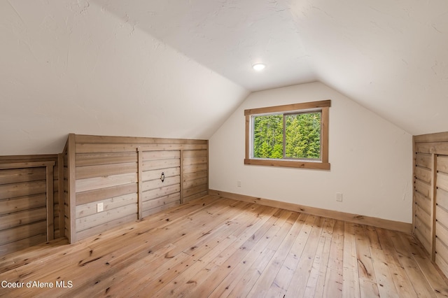 164 Generations Dr, Athol, ID 83801 - additional living space featuring light wood-style floors, baseboards, and lofted ceiling