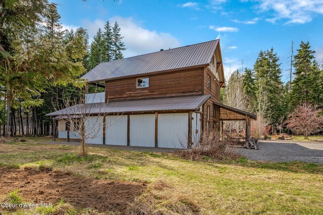 164 Generations Dr, Athol, ID 83801 - exterior space with a barn, metal roof, and an outbuilding