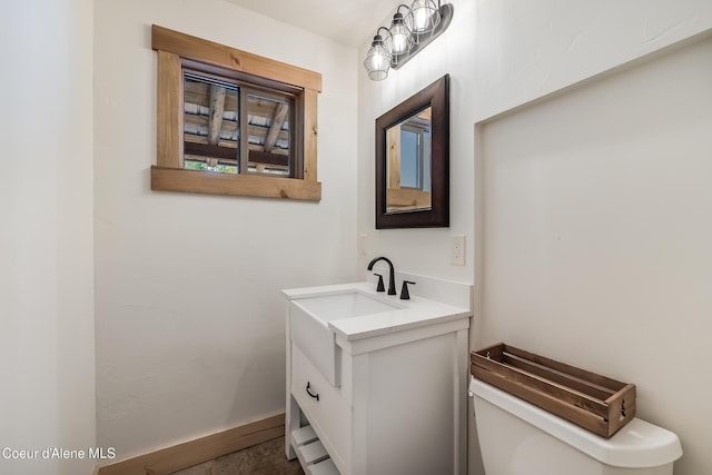 164 Generations Dr, Athol, ID 83801 - half bathroom with vanity, baseboard heating, and toilet