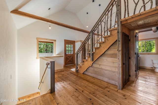 164 Generations Dr, Athol, ID 83801 - staircase with hardwood / wood-style flooring and lofted ceiling