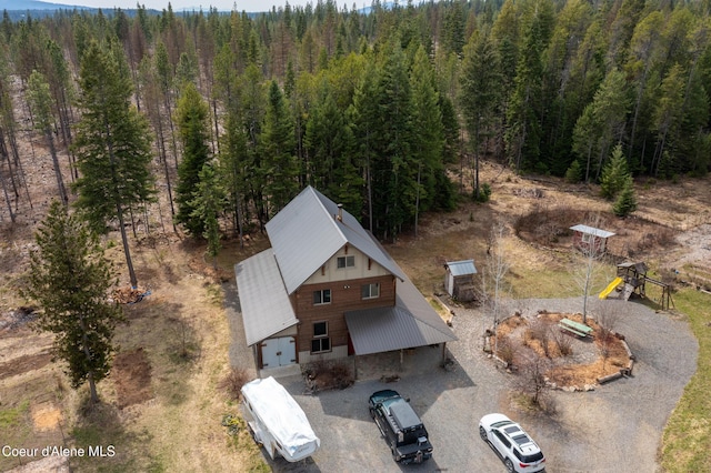 164 Generations Dr, Athol, ID 83801 - birds eye view of property featuring a wooded view