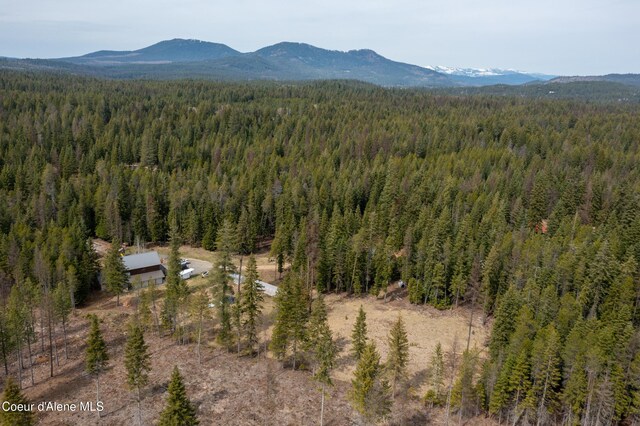 164 Generations Dr, Athol, ID 83801 - drone / aerial view featuring a wooded view and a mountain view