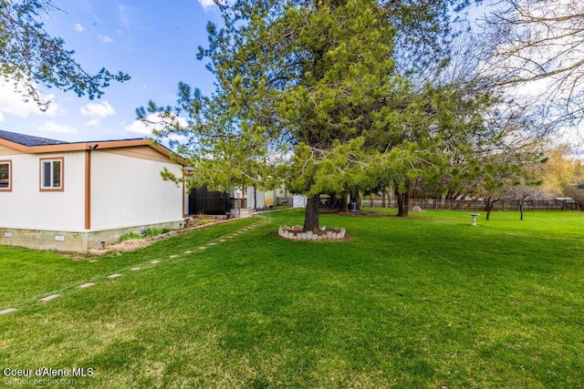 view of yard with fence