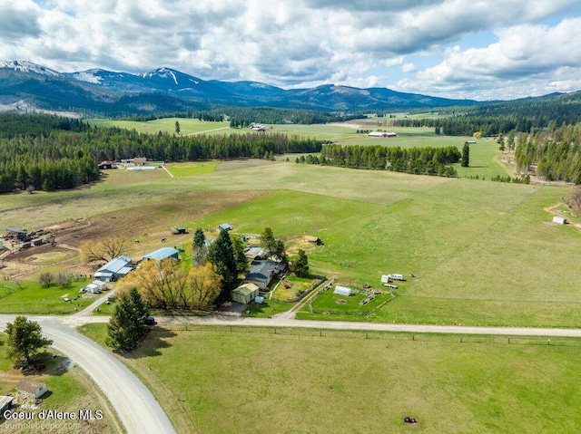 birds eye view of property featuring a rural view and a mountain view