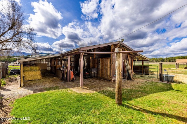 view of outbuilding featuring an outbuilding and an exterior structure