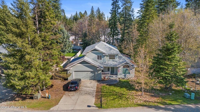 view of front of home with an attached garage and driveway