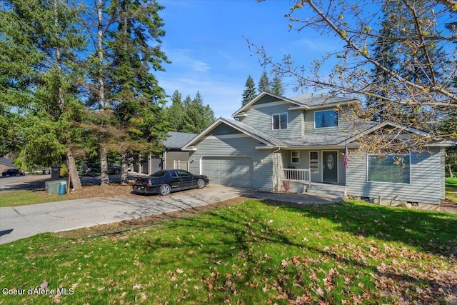 view of front of property with a garage, a front yard, and driveway