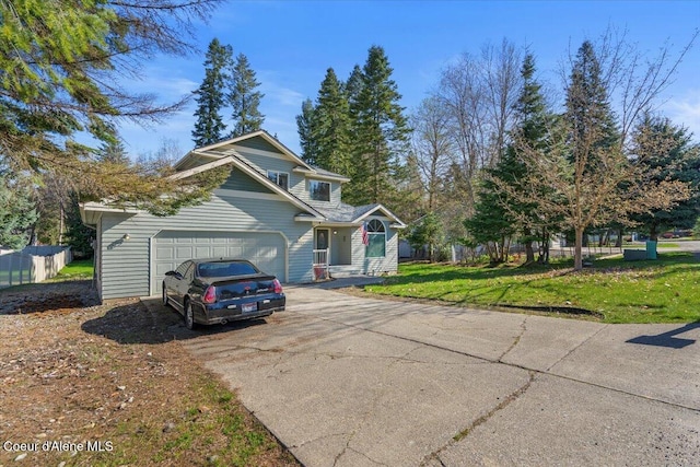 view of side of property featuring an attached garage, fence, a lawn, and driveway