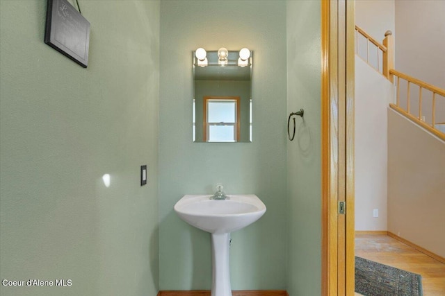 bathroom with wood finished floors