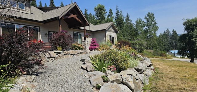 view of property exterior featuring a yard