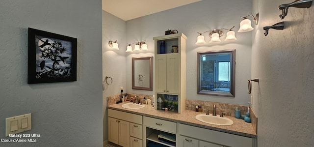 bathroom featuring double vanity and a sink