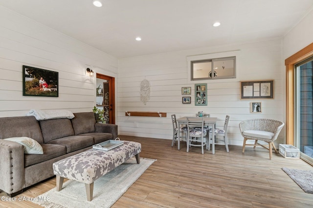 137 Bitterroot Pass, Sagle, ID 83860 - living area featuring recessed lighting, light wood finished floors, and wooden walls
