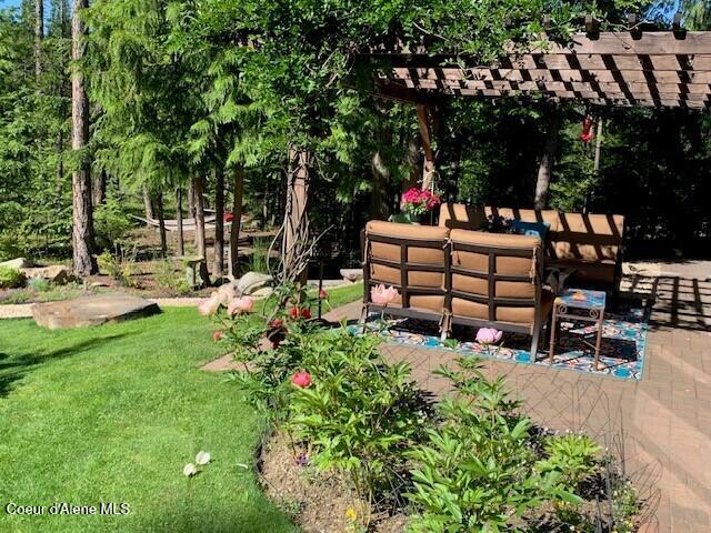 137 Bitterroot Pass, Sagle, ID 83860 - view of yard with a pergola
