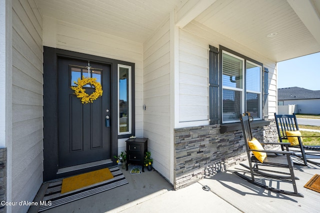 4209 May Ella Lp, Post Falls, ID 83854 - property entrance with stone siding and covered porch
