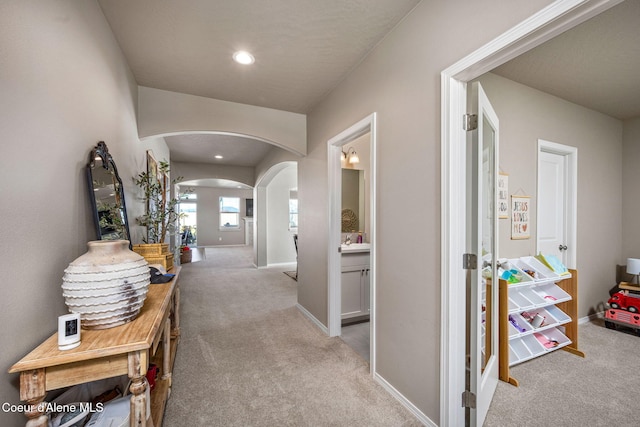 4209 May Ella Lp, Post Falls, ID 83854 - corridor with arched walkways, baseboards, carpet, and recessed lighting