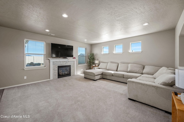 4209 May Ella Lp, Post Falls, ID 83854 - living area with carpet, a textured ceiling, and recessed lighting