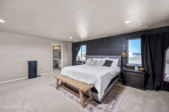 4209 May Ella Lp, Post Falls, ID 83854 - bedroom with recessed lighting, visible vents, baseboards, a textured ceiling, and light colored carpet