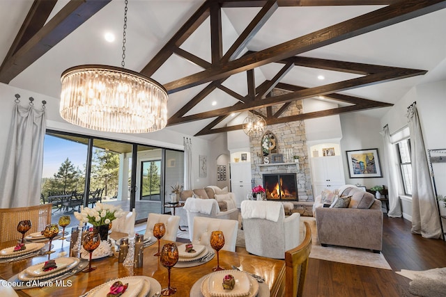 dining area featuring an inviting chandelier, wood-type flooring, beam ceiling, and recessed lighting