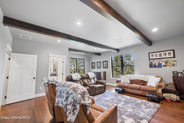living room with visible vents, baseboards, dark wood finished floors, beam ceiling, and recessed lighting